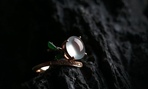 Jade jewelry for working women featuring rose gold ring with jade leaves